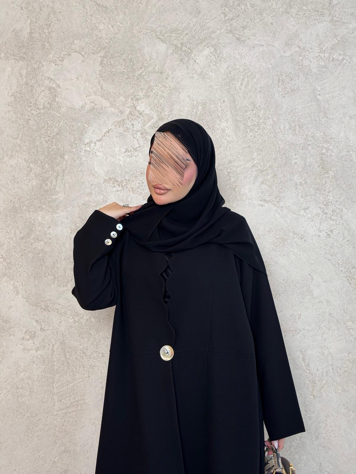 عبايـــة